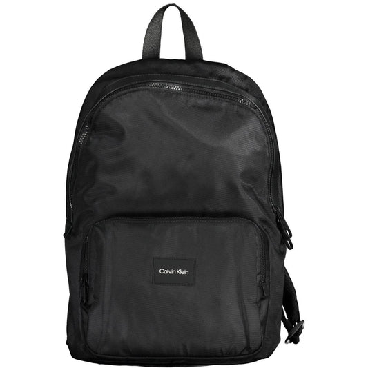 Calvin Klein Black Polyester Men Backpack with sleek design and bold logo, featuring adjustable straps and multiple pockets.