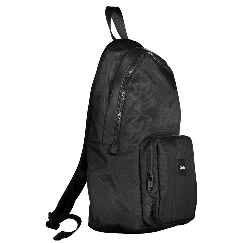 Calvin Klein Black Polyester Men Backpack with adjustable straps and multiple pockets, crafted from recycled materials.