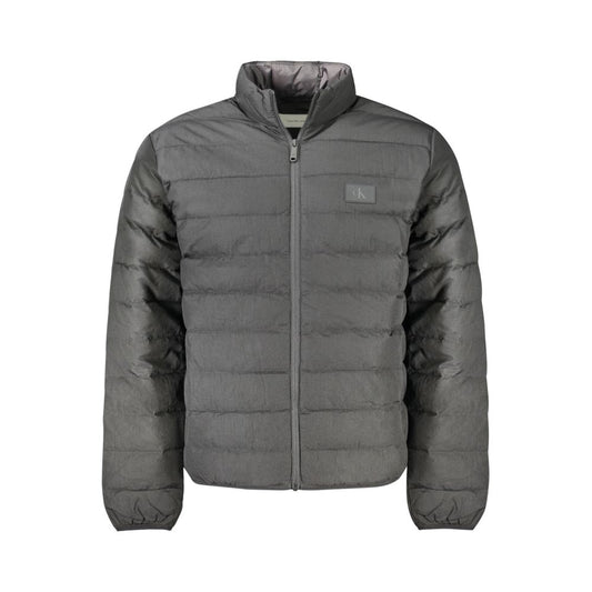 Calvin Klein Black Polyamide Men Jacket with sustainable design featuring a discreet logo on the front, offering comfort and durability.