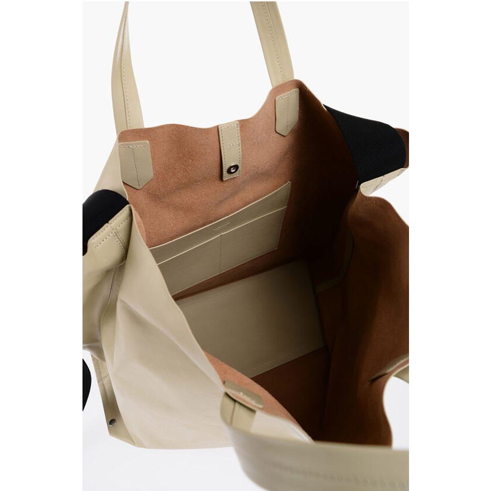 Front view with bag zipped and handles upright.