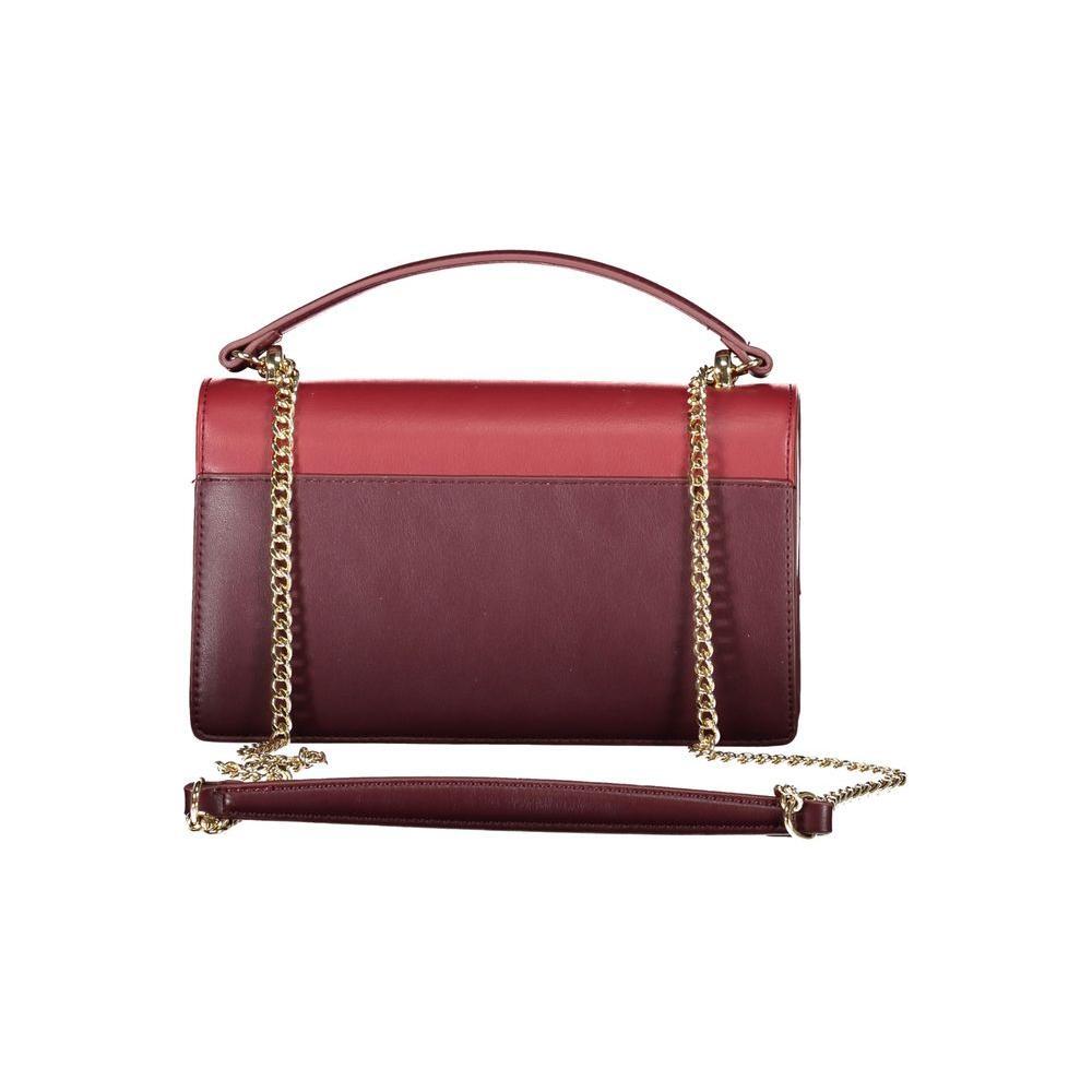 Front view with bag zipped and handles upright.