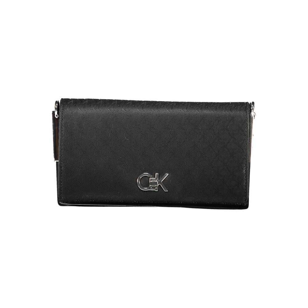 Calvin Klein Black Polyester Women Handbag with elegant silver logo and chic design, perfect for style and functionality.