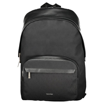 Calvin Klein Black Polyester Men Backpack featuring sleek design with external pocket and laptop compartment.