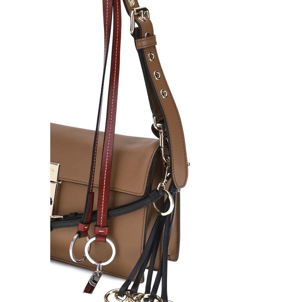 Front view with bag zipped and handles upright.