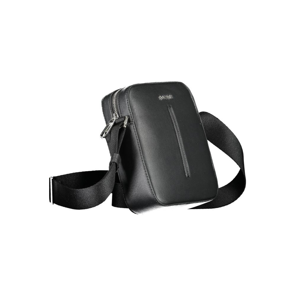 Calvin Klein Black Polyester Men Shoulder Bag with adjustable strap, sleek design, and zip closure for modern elegance and ethical fashion.