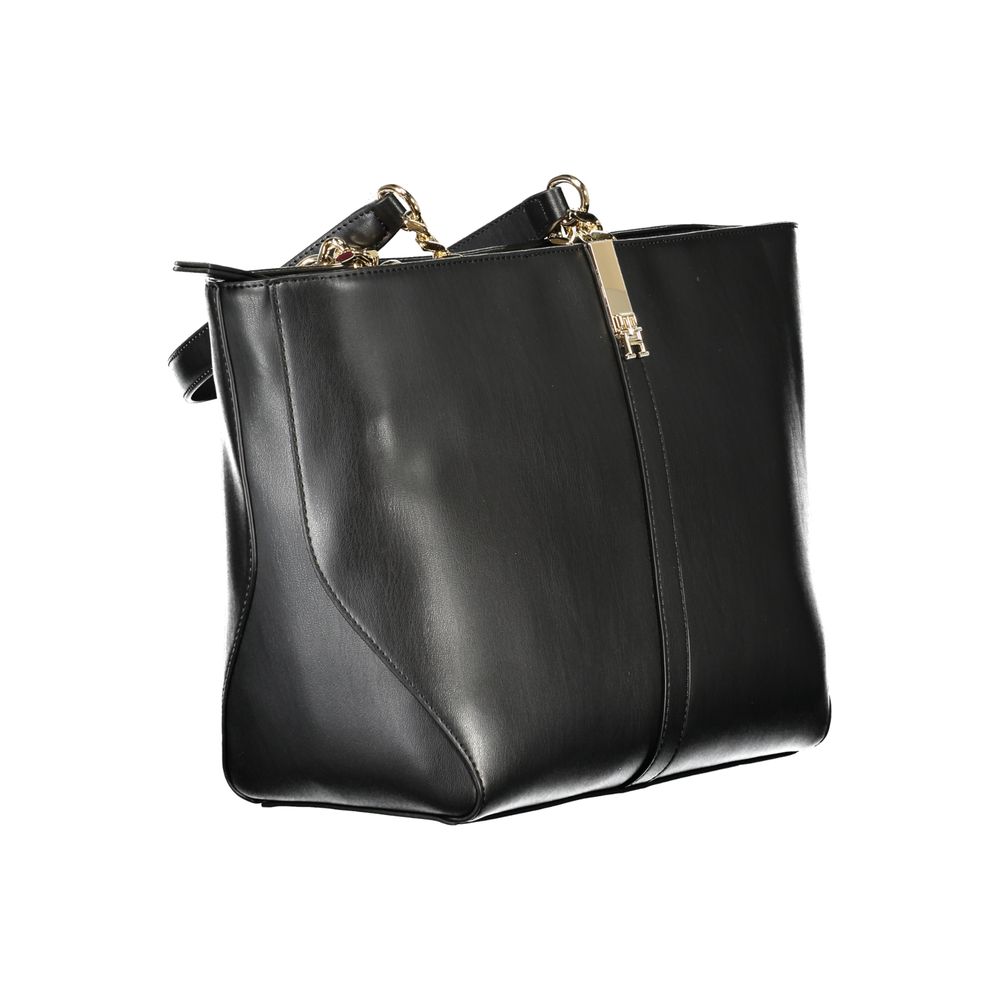 Front view with bag zipped and handles upright.