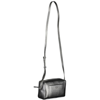 Calvin Klein Black Polyester Handbag with adjustable shoulder strap, external pocket, and zip closure.