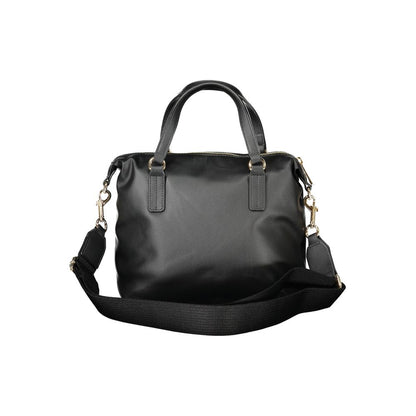 Tommy Hilfiger Black Polyester Women Handbag with detachable shoulder strap and logo, sleek design for modern fashion enthusiasts.