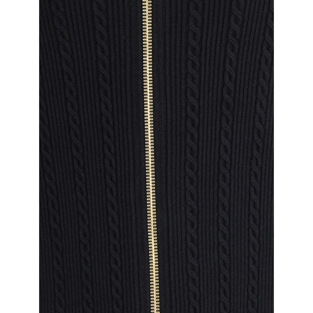 Front view with bag zipped and handles upright.