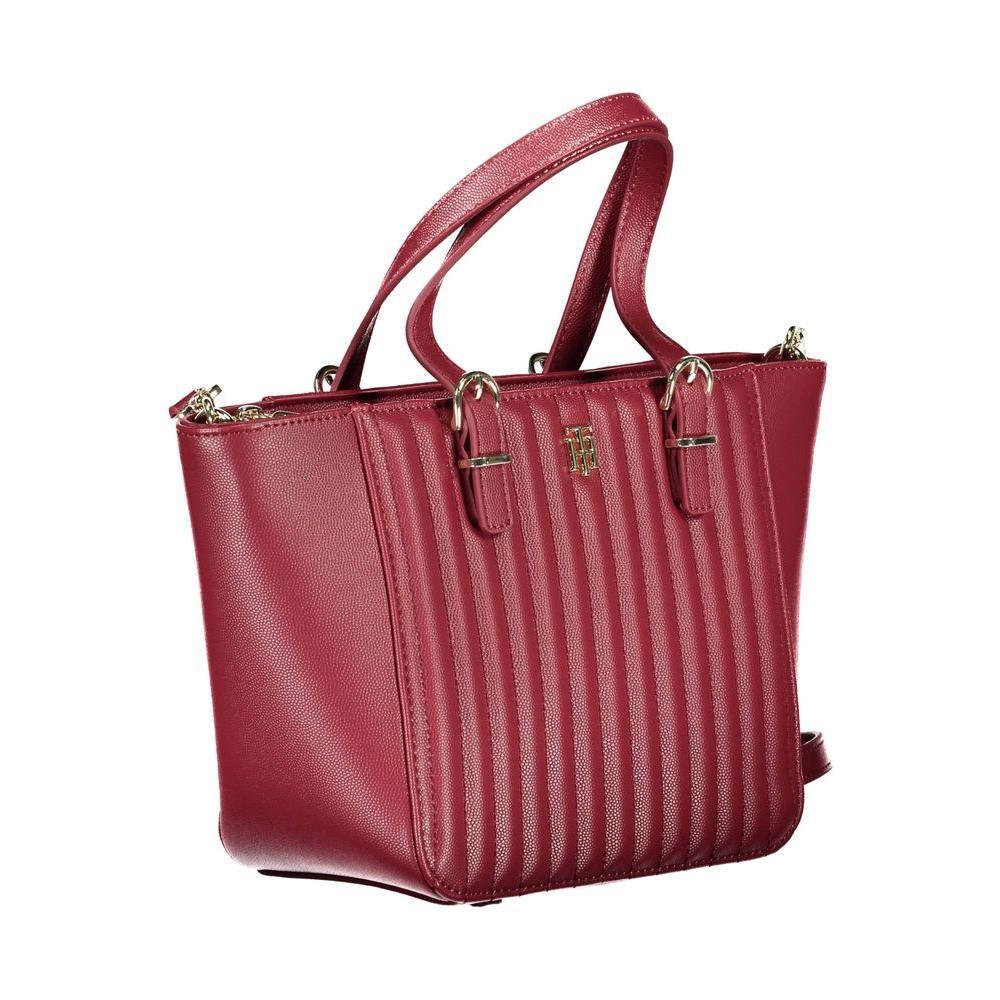 Front view with bag zipped and handles upright.
