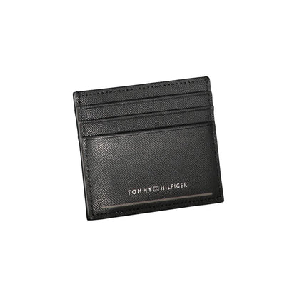 Tommy Hilfiger Black Leather Wallet with card holder, central pocket, and contrast details featuring logo.
