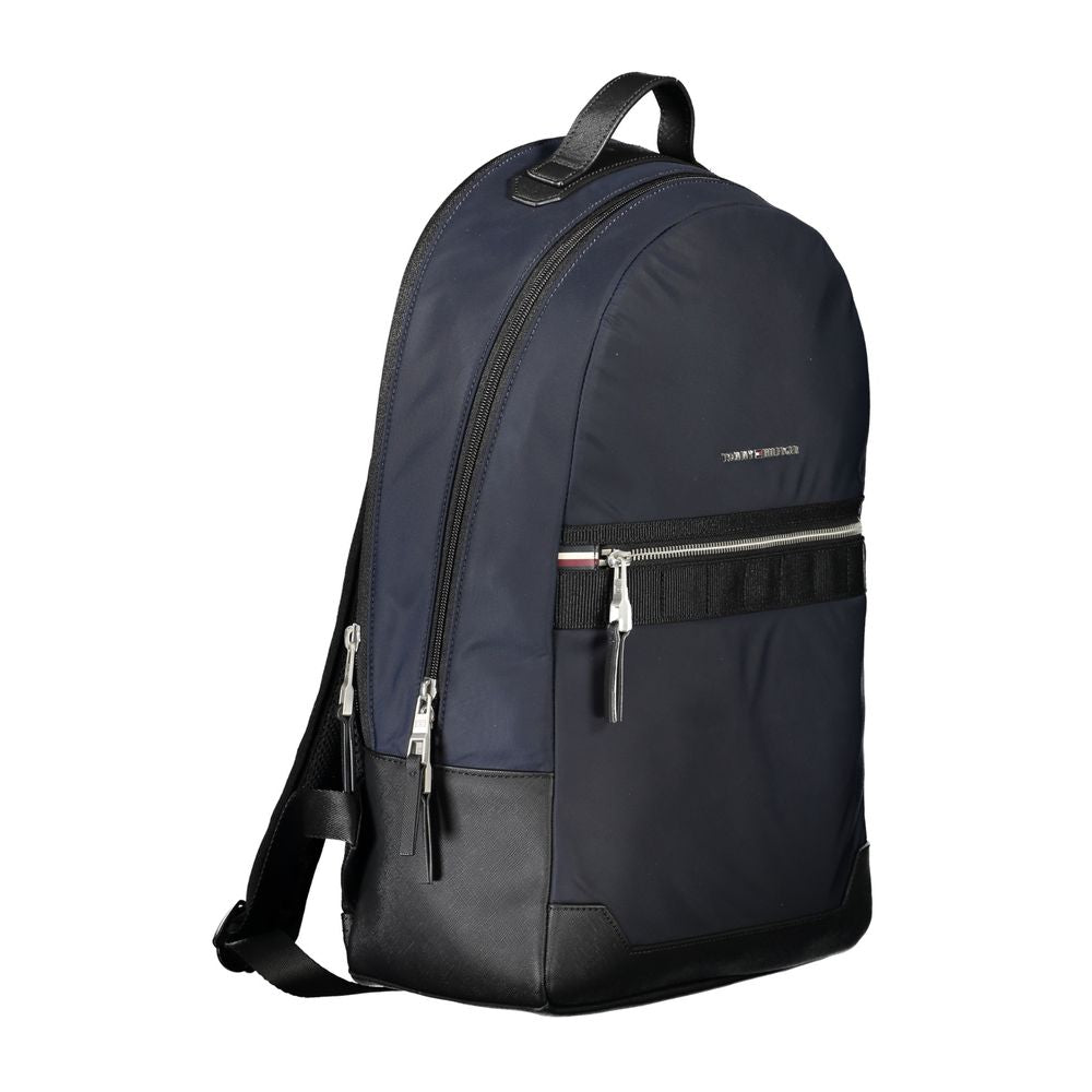Tommy Hilfiger Blue Polyester Backpack with adjustable straps, external pocket, laptop compartment, contrasting details, zip closure.