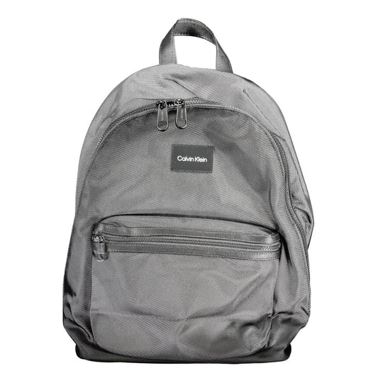 Calvin Klein Black Polyester Backpack with handle, adjustable straps, multiple pockets, water-repellent, zip closure.