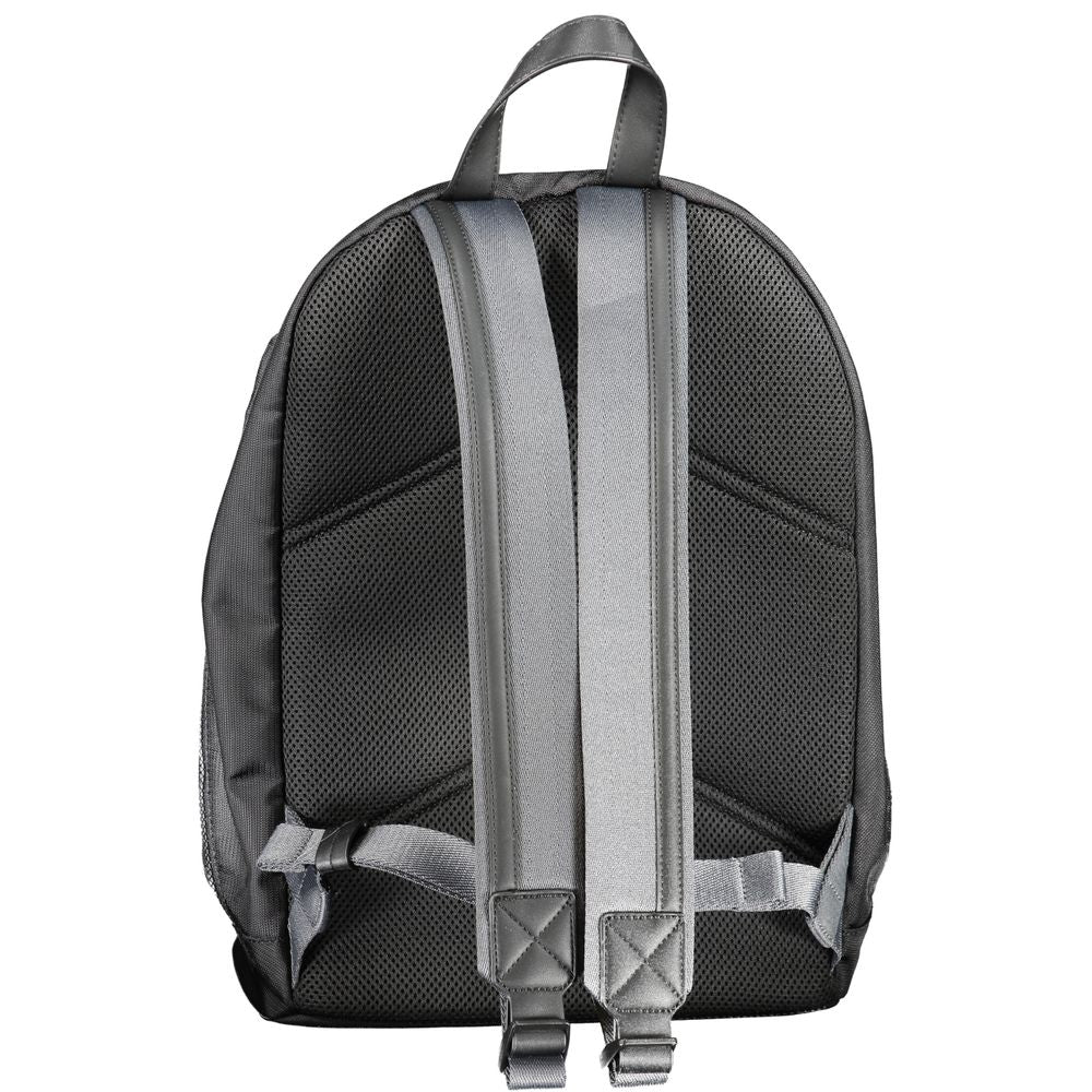 Back view of the Calvin Klein Black Polyester Backpack with adjustable straps and water-repellent material.
