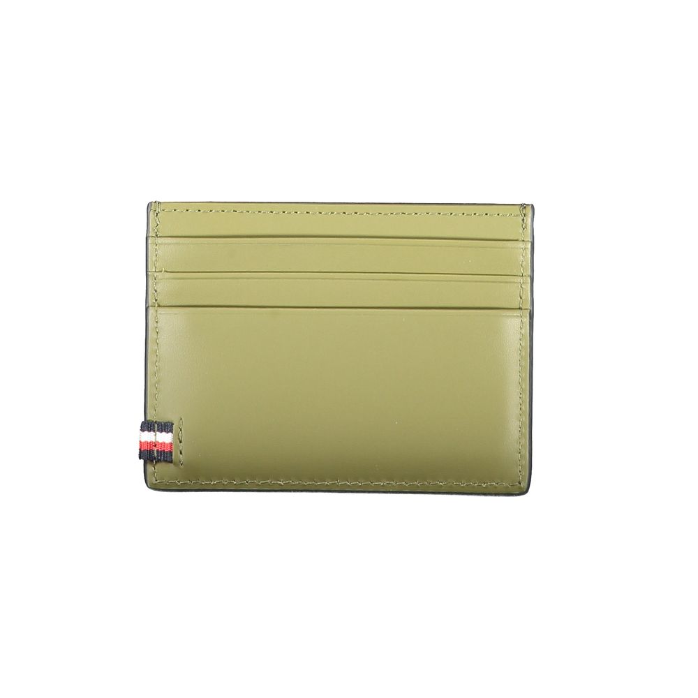 Tommy Hilfiger Black Leather Wallet with card holder, central pocket, card spaces, and contrast details featuring logo.