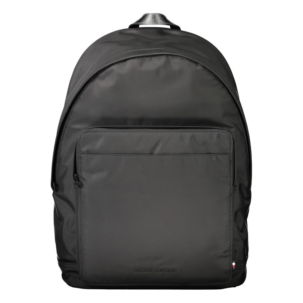 Tommy Hilfiger Black Polyester Backpack with logo, adjustable straps, external pockets, and laptop compartment.