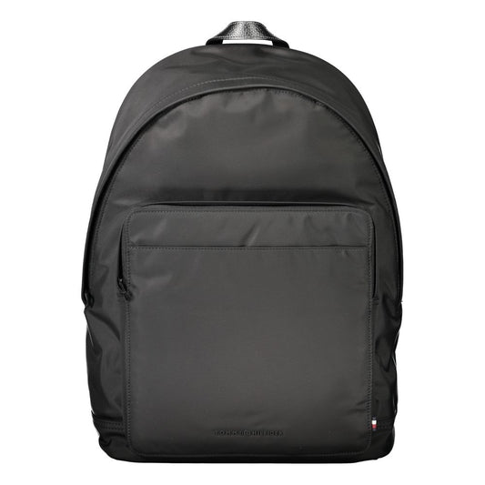 Tommy Hilfiger Black Polyester Backpack with logo, adjustable straps, external pockets, and laptop compartment.