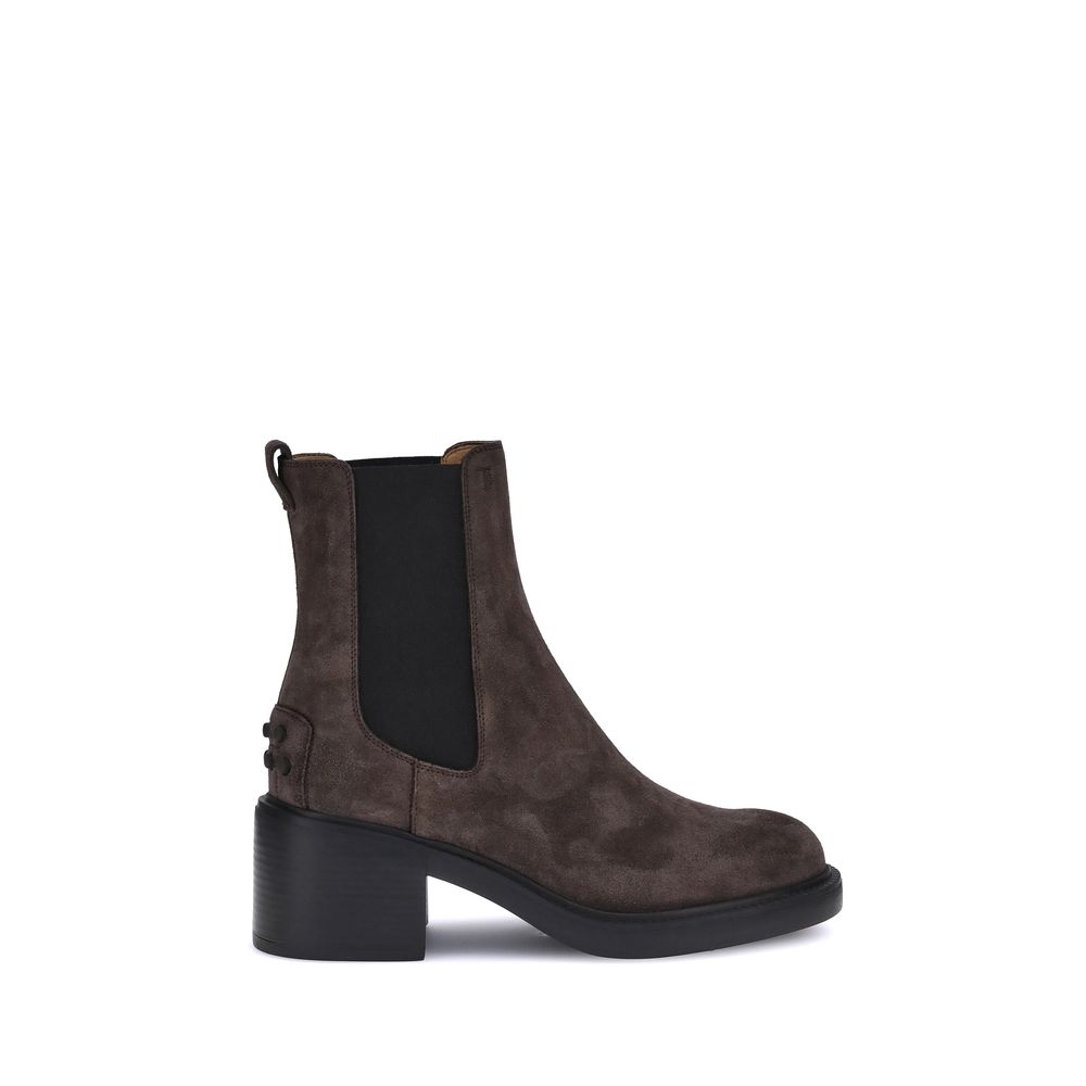 Side view of Tod's Brown Calf Leather Bos Taurus Ankle Boots with elastic inserts and rubber lug sole for style and comfort.