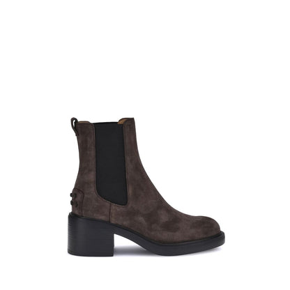 Side view of Tod's Brown Calf Leather Bos Taurus Ankle Boots with elastic inserts and rubber lug sole for style and comfort.