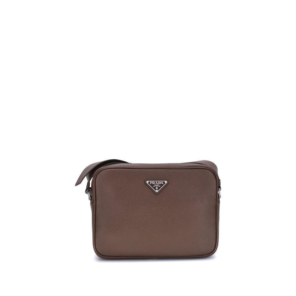 Front view with bag zipped and handles upright.