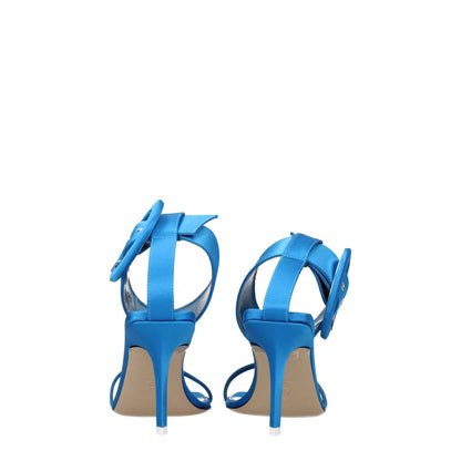 The Attico Light Blue Satin Stiletto Heel Sandals with buckle closure and leather sole, side view highlighting open toe and turquoise hue.