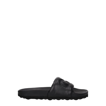 Off-White Black Leather Slippers with front logo, round toe, and rubber sole. Designed by Off-White, MPN: OMIT001LEA0011010.