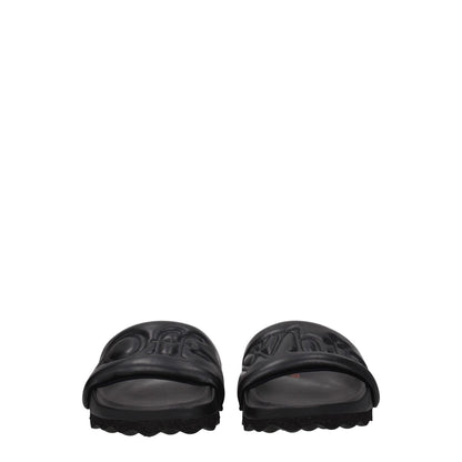 Off-White Black Leather Slippers with logo, round toe, rubber sole, designed for casual style.