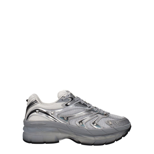 Valentino Garavani Gray Fabric Athletic Sneakers with studs and round toe, lace-up closure, leather materials, and rubber sole.