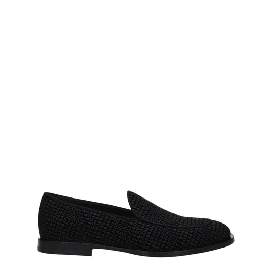 Dolce & Gabbana Black Velvet Slip-On Loafers with leather sole, round toe, low flat heel, and logo detail.
