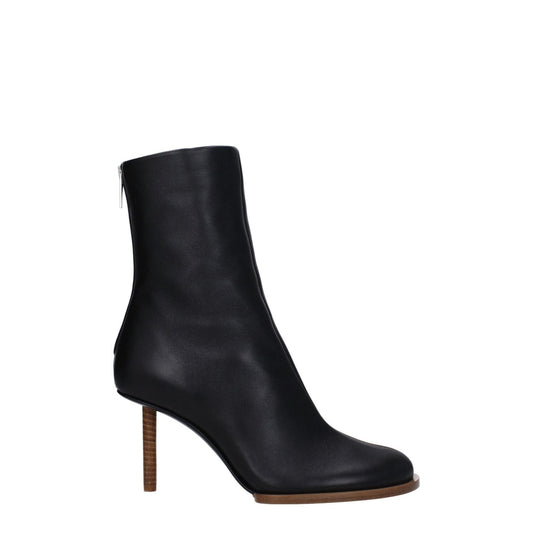 Jacquemus Black Leather Ankle Boots with zip closure, high heel, and square toe, style code F79089, side view