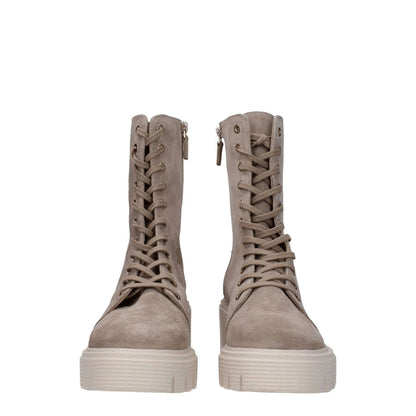 Stuart Weitzman Beige Leather Ankle Boots with lace-up closure, mid heels, and rubber sole. Suede material, vintage style.