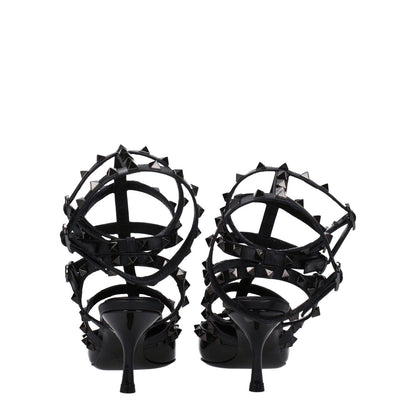 Back view of Valentino Garavani Black Leather Stiletto Heel Sandals with studs and buckle closure.