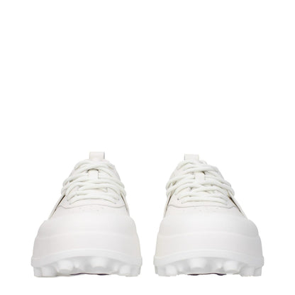 Jil Sander White Leather Sneakers with rubber sole, round toe, and mid heels. Sporty glam style with lace-up closure. MPN WS0040P6244102.