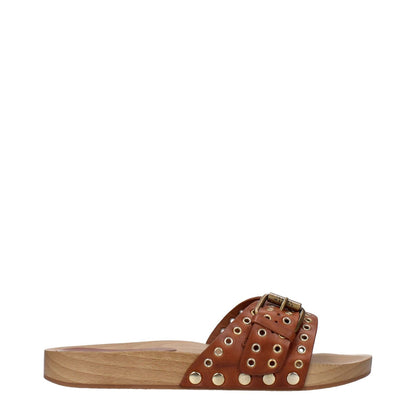 Isabel Marant Brown Leather Slippers with buckle closure and open toe design, featuring a low flat heel and rubber sole.