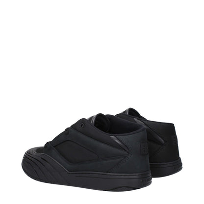 Givenchy Black Fabric Low Top Sneakers with lace-up closure, rubber sole, and logos on front, side, and back.