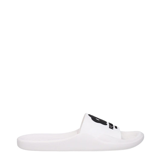 Kenzo White Cotton Slippers with open toe, rubber sole, and front logo design. Casual, low flat heel style. MPN: FE52MU110P5102.
