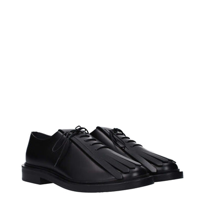 Max Mara Black Leather Oxfords And Derbies with lace-up design and rubber sole, featuring round toe and low flat heel.