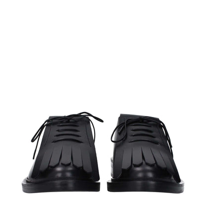 Max Mara Black Leather Oxfords And Derbies with lace-up design and rubber sole, featuring round toe and low flat heel.