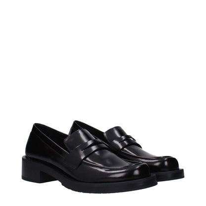 Stuart Weitzman Black Leather Slip-On Loafers with mid heels and round toe design, featuring rubber sole for comfortable fit, style MPN PALMERAPSSG649BLACK
