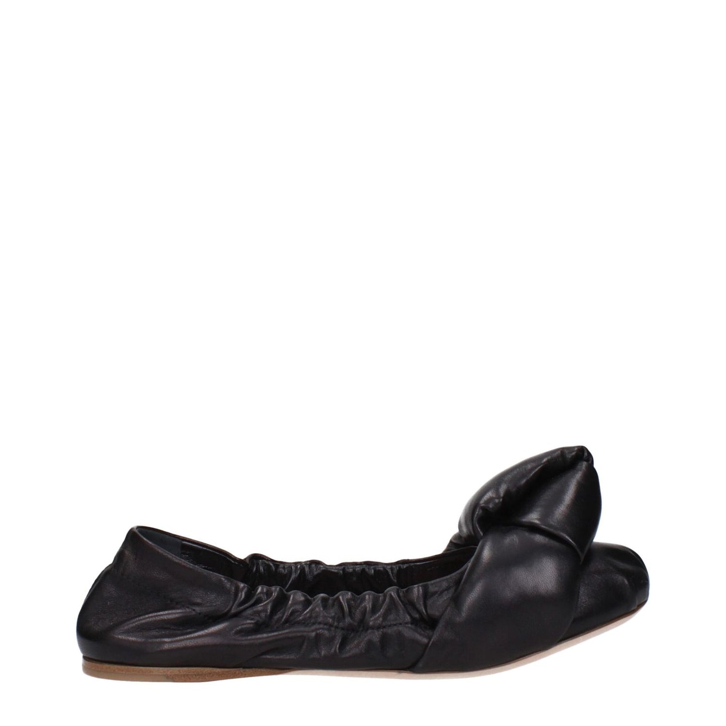Side view of Miu Miu Black Leather Ballet Flats with low heel and front detail, featuring a round toe design and leather sole.