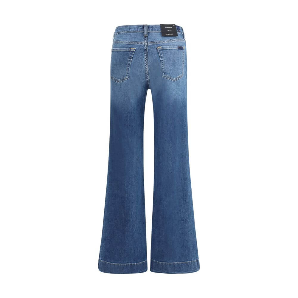 Back view of 7FOR Blue Cotton Flared Jeans with patch pockets and waist loops, showcasing modern silhouette and feminine design.