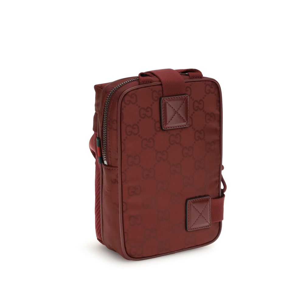 Gucci Bordeaux Polyamide Shoulder Bag with GG nylon and green-red web detailing, featuring tone-on-tone logo and mesh design.