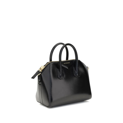 Givenchy Black Calf Leather Bos Taurus Handbag with glossy finish, geometric pattern, and detachable shoulder strap.