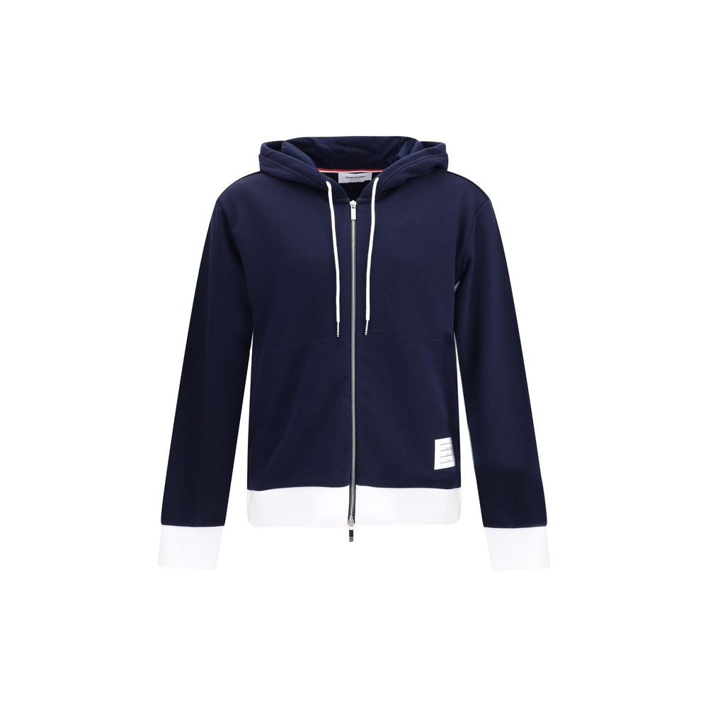 Thom Browne Blue Cotton Sweatshirt with drawstring hood and zipper, featuring side welt pockets and contrasting cuffs for iconic style.