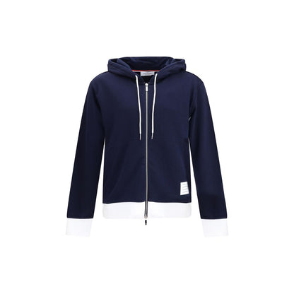 Thom Browne Blue Cotton Sweatshirt with drawstring hood and zipper, featuring side welt pockets and contrasting cuffs for iconic style.