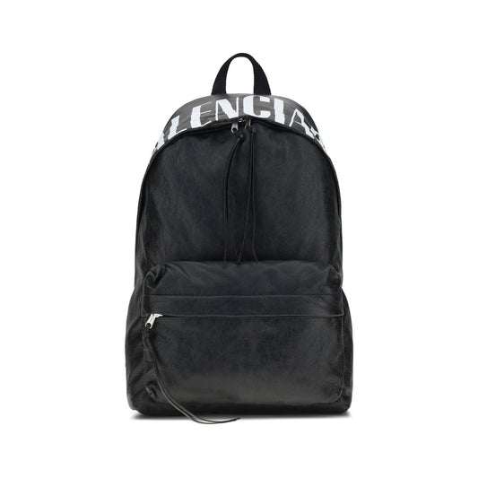 Balenciaga Black Lamb Ovis Aries Aries Backpack with crinkle effect lambskin, printed logo, and zipper closure.