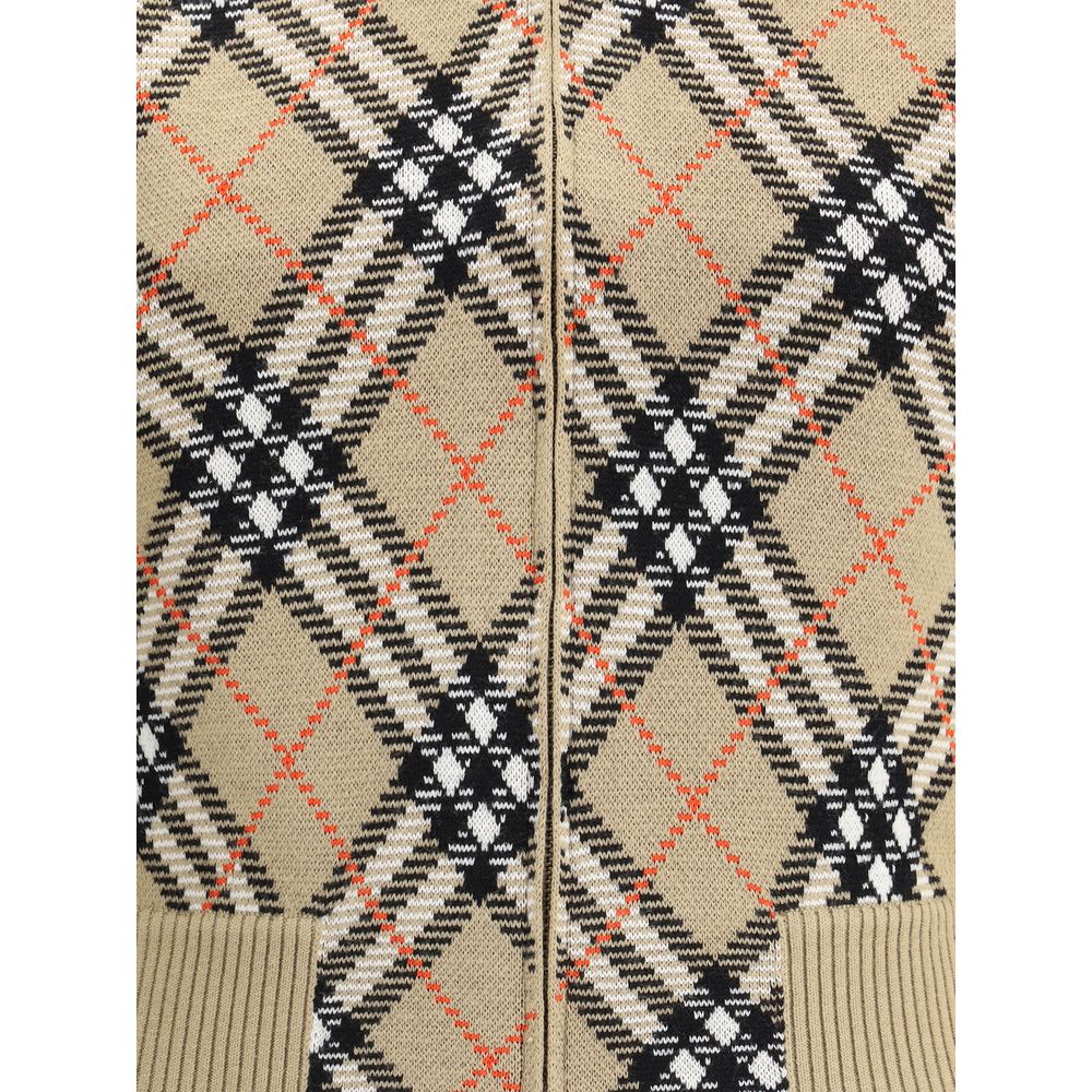 Burberry Beige Wool Cardigan with iconic check pattern, featuring a front zipper and ribbed details for a classic, stylish look.