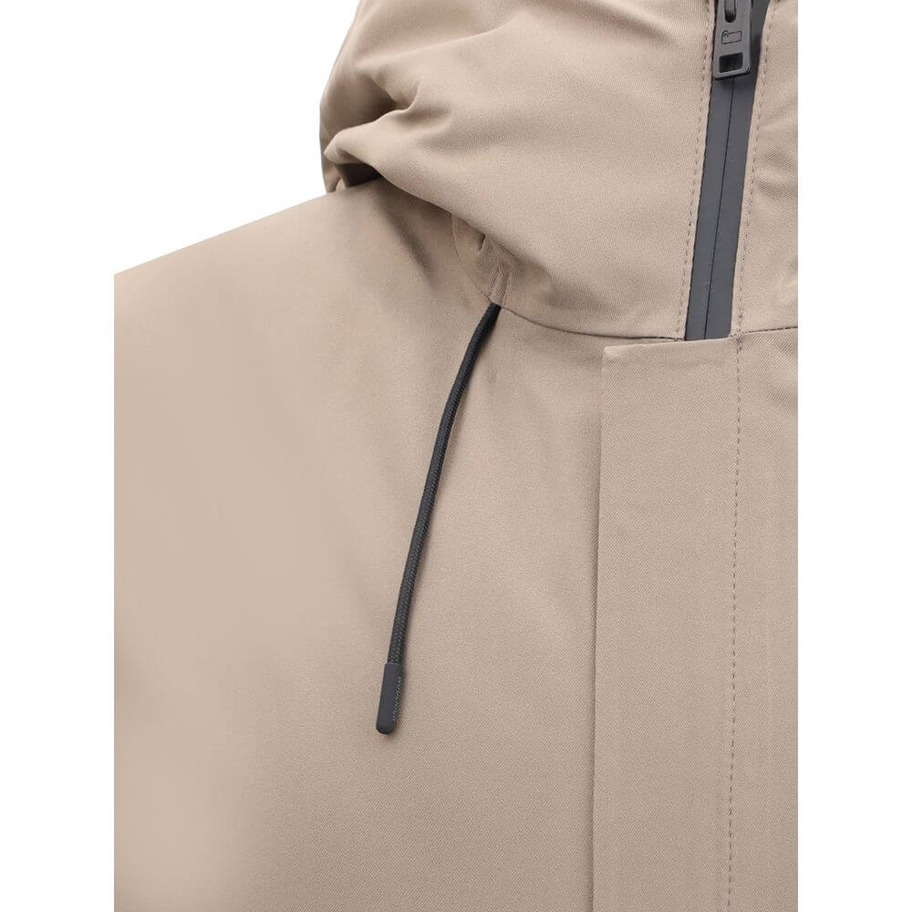 Close-up of Woolrich Beige Polyester Shell Jacket with adjustable hood and zipper detail.