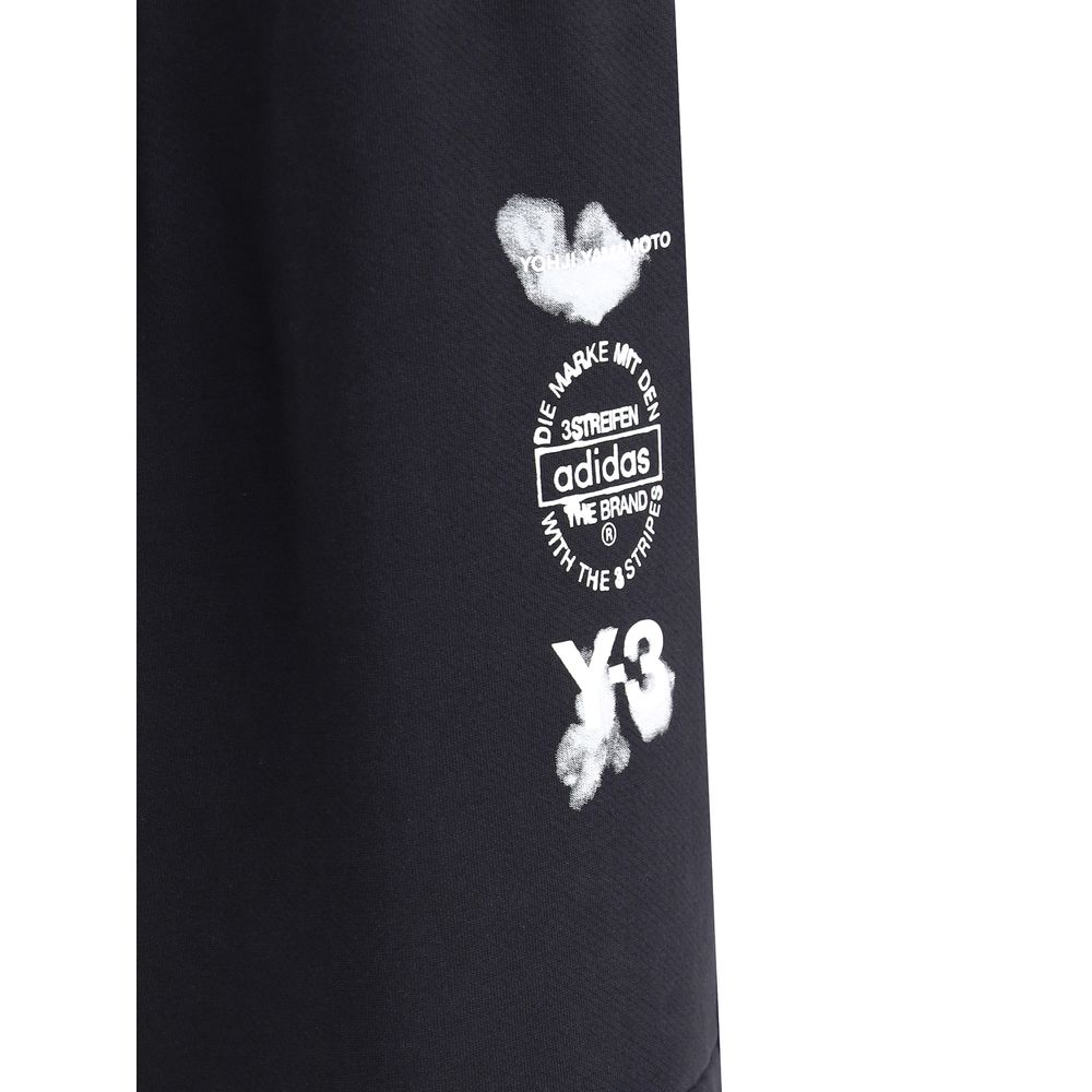 Close-up of logo on Y-3 Black Cotton Joggers (Workout Pants) showcasing minimalist design and bold character.