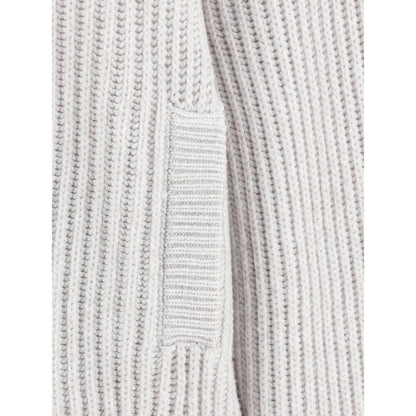 Close-up of the Brunello Cucinelli White Cashmere Cardigan showcasing ribbed texture and welt pocket detail.